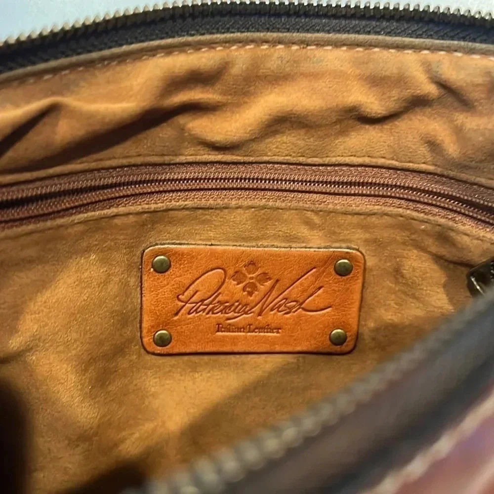 Patricia Nash Cassini Wristlet with tooled floral pattern in Florence Brown